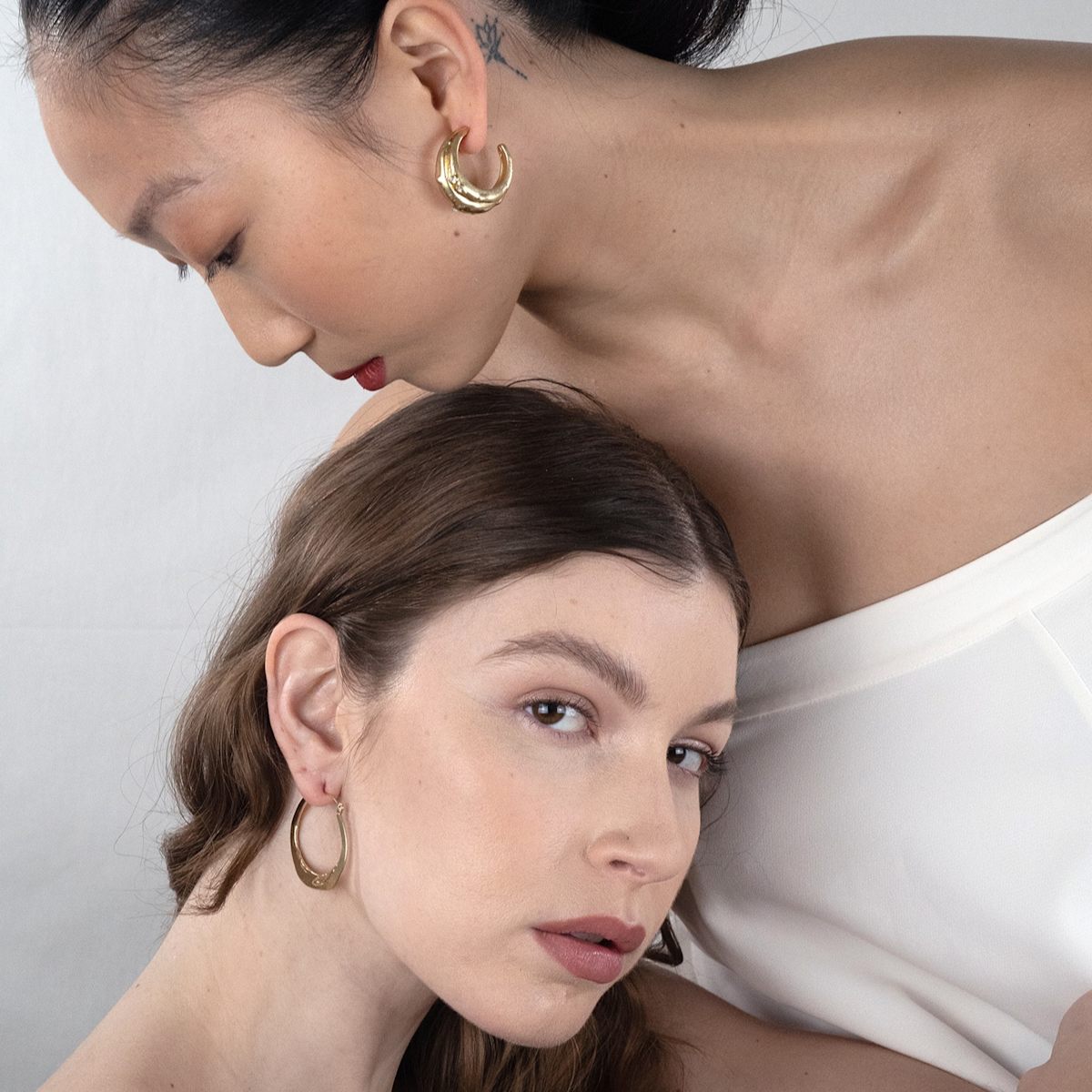 Curved Hoop Embrace Earrings