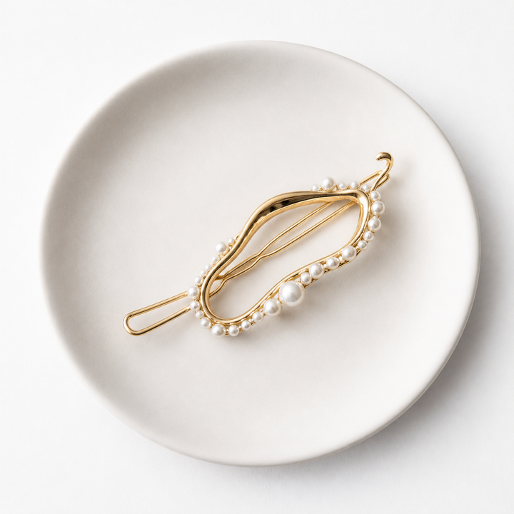 Rare Matters hair accessory displayed on a white ceramic plate