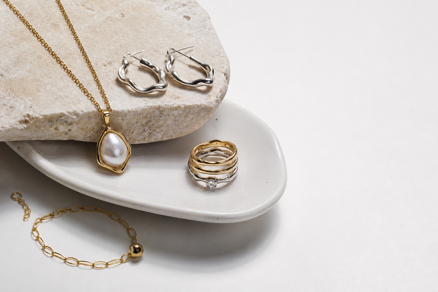 Rare Matters sculptural jewelry still life on stone and ceramic surfaces